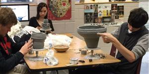 ceramics class making Joman pots. 